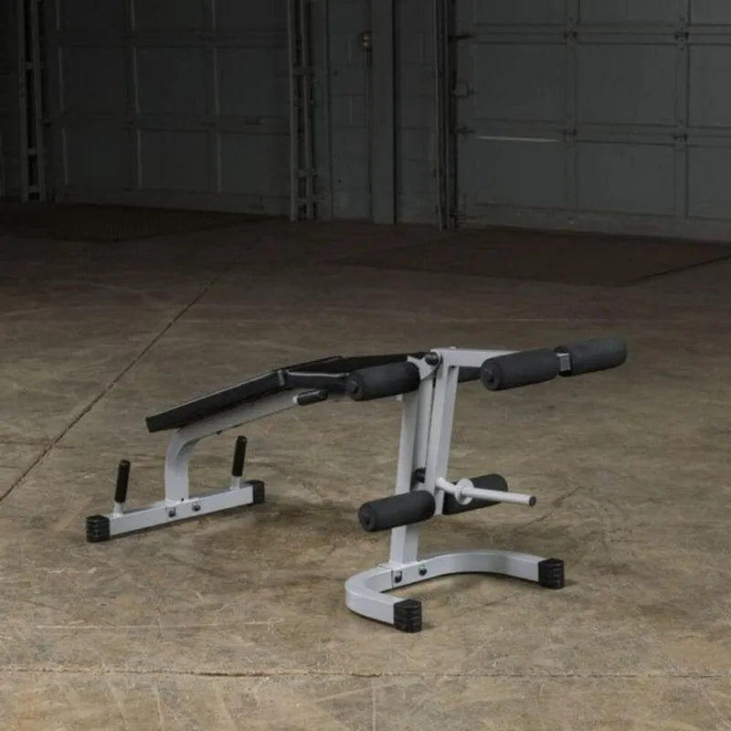 Body-Solid Powerline Leg Extension & Curl Machine PLCE165X - on a concrete floor