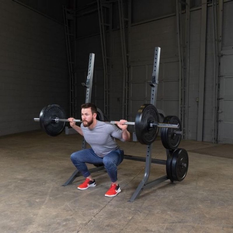 Body-Solid Powerline Multi Press Rack PMP150 - man doing squats