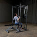 Body-Solid Powerline Power Rack PPR1000 - man doing shoulder press 