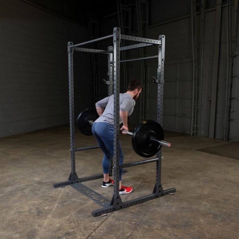 Body-Solid Powerline Power Rack PPR1000 - man lifting weights