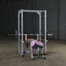 Body-Solid Powerline Power Rack PPR200X - woman exercising