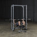 Body-Solid Powerline Power Rack PPR200X - man doing exercise on a bench