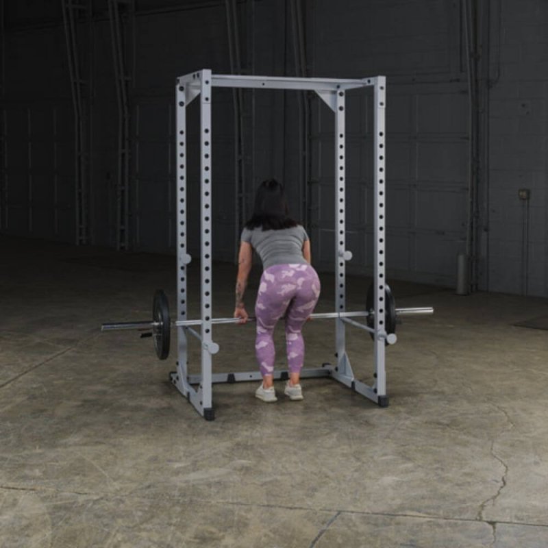 Body-Solid Powerline Power Rack PPR200X - woman lifting weight