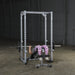 Body-Solid Powerline Power Rack PPR200X - woman exercising on bench