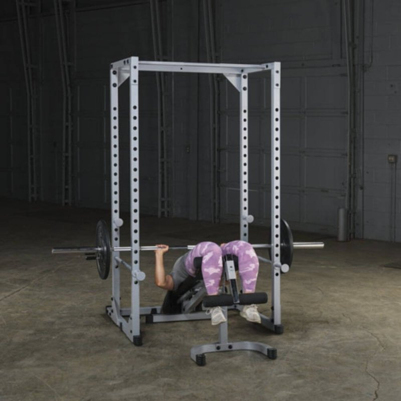 Body-Solid Powerline Power Rack PPR200X - woman exercising on bench