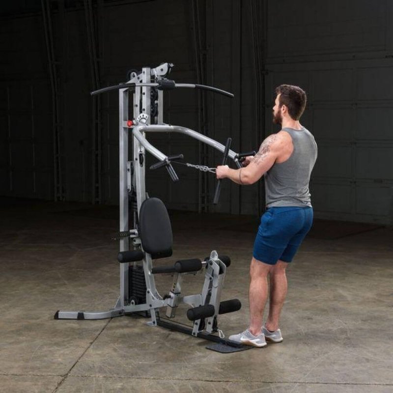 Body-Solid Powerline Single Stack Home Gym BSG10X - man pulling a chain 