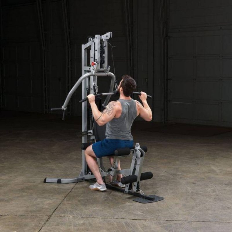 Body-Solid Powerline Single Stack Home Gym BSG10X - man sitting on bench 