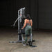 Body-Solid Powerline Single Stack Home Gym BSG10X - woman working out