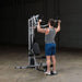 Body-Solid Powerline Single Stack Home Gym BSG10X - man doing shoulder press