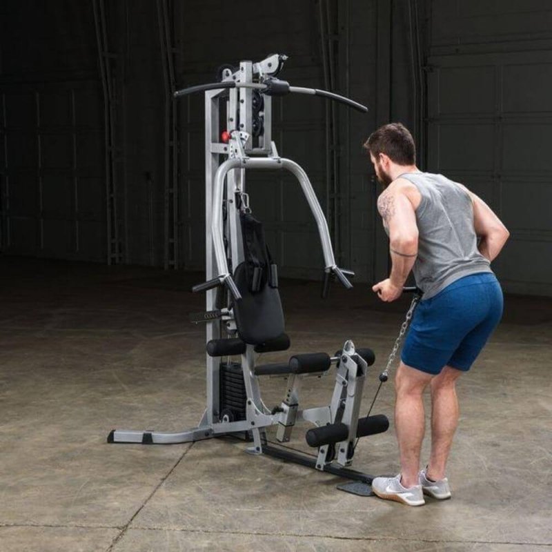 Body-Solid Powerline Single Stack Home Gym BSG10X - man pulling a chain 