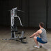 Body-Solid Powerline Single Stack Home Gym BSG10X - man squatting