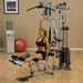 Body-Solid Powerline Single Stack Home Gym P2X - woman working out 