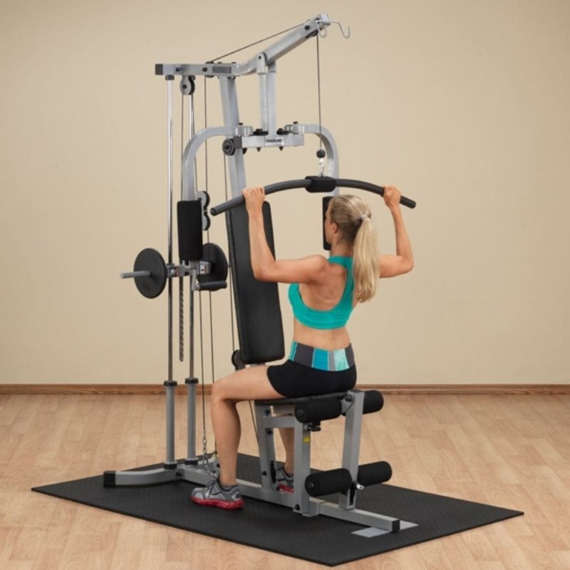 Body-Solid Powerline Single Stack Home Gym PHG1000X - woman doing bench press