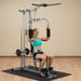 Body-Solid Powerline Single Stack Home Gym PHG1000X - woman doing shoulder press