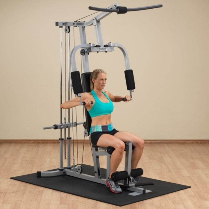 Body-Solid Powerline Single Stack Home Gym PHG1000X - woman working out