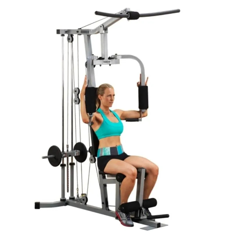 Body-Solid Powerline Single Stack Home Gym PHG1000X - woman using it 
