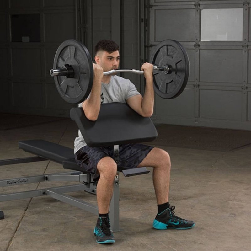 Body-Solid Preacher Curl Station GPCA1 - Man using the product while working out