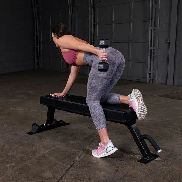 Body Solid Pro Club Line Flat Utility Bench - woman working out