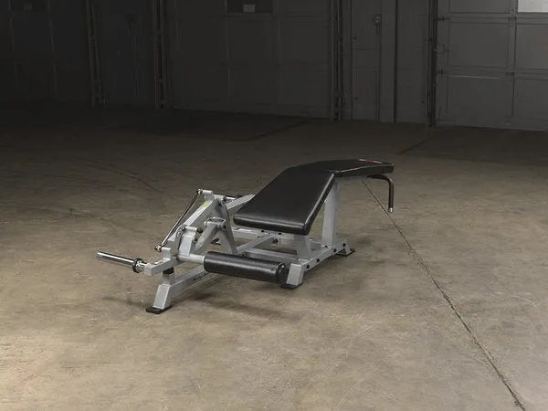 Body Solid Pro Club Line Leverage Leg Curl - on concrete floor