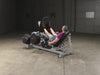 Body Solid Pro Club Line Leverage Leg Press - man exercising on it