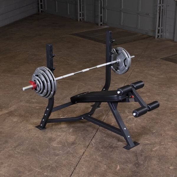 Body Solid Pro Club Line Oly Decline Bench - with barbel on it 