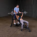 Body Solid Pro Club Line Oly Incline Bench - man and woman working out