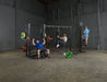 Body Solid Pro Club Line Power Rack, Half Rack Connecting Bar - group of people working out