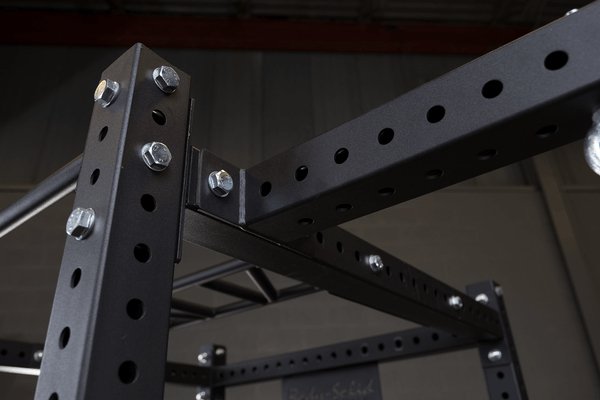 Body Solid Pro Club Line Power Rack, Half Rack Connecting Bar - close up of metal bars 