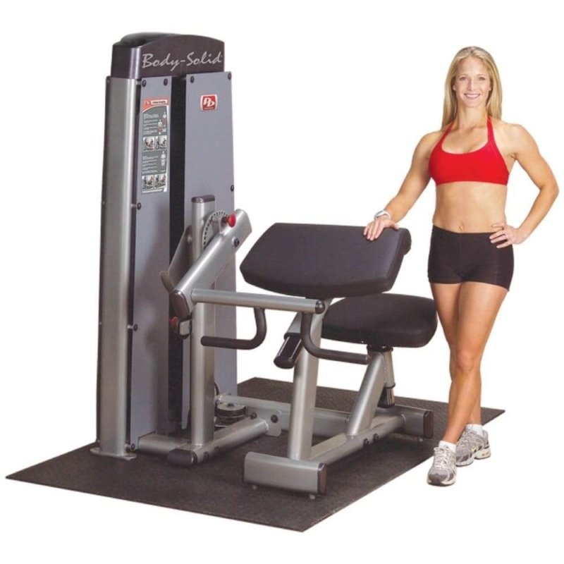 Body-Solid Pro Dual Commercial Bicep/Tricep Machine DBTC-SF - woman standing next to it