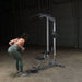 Body-Solid Pro Lat Pulldown Low Row Machine GLM83  - woman working out bent over row