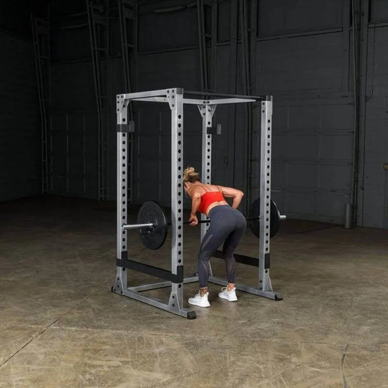 Body-Solid Pro Power Rack GPR378 - Woman on squat position holding barbell