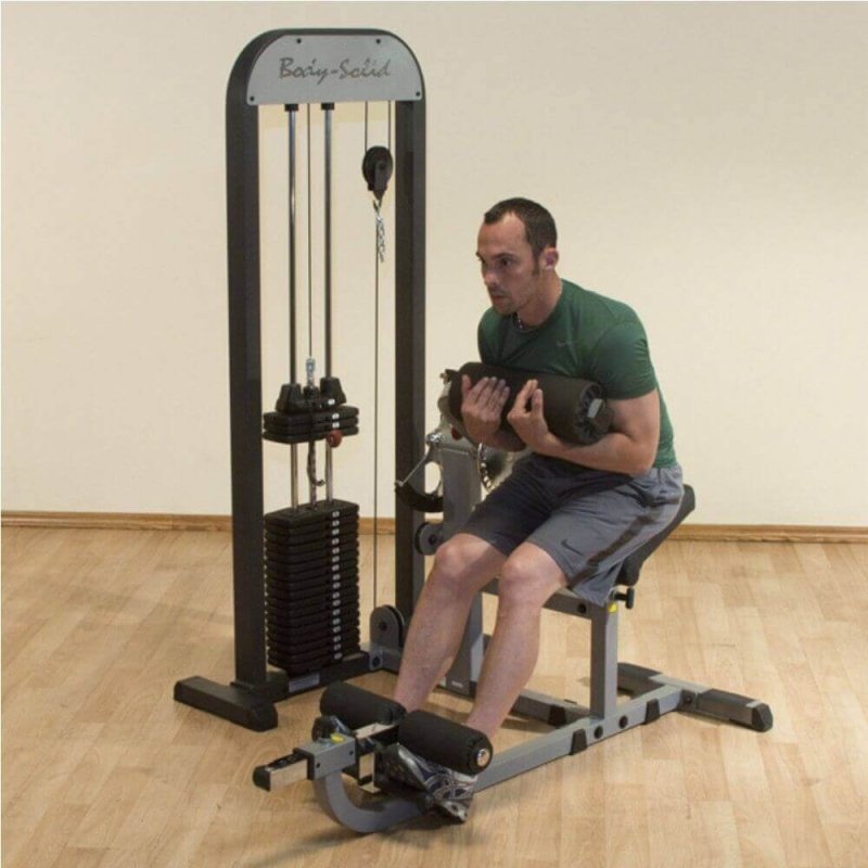 Body-Solid Pro Select Ab And Back Machine GCAB-STK - Man curl position while holding cushioned roller