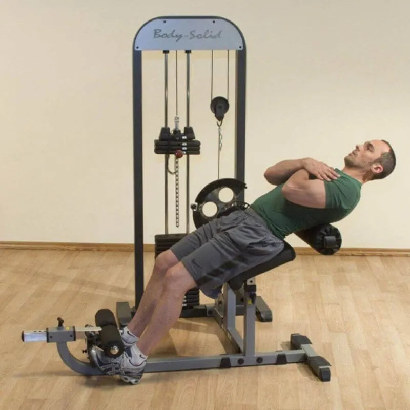 Body-Solid Pro Select Ab And Back Machine GCAB-STK man working out side view photo