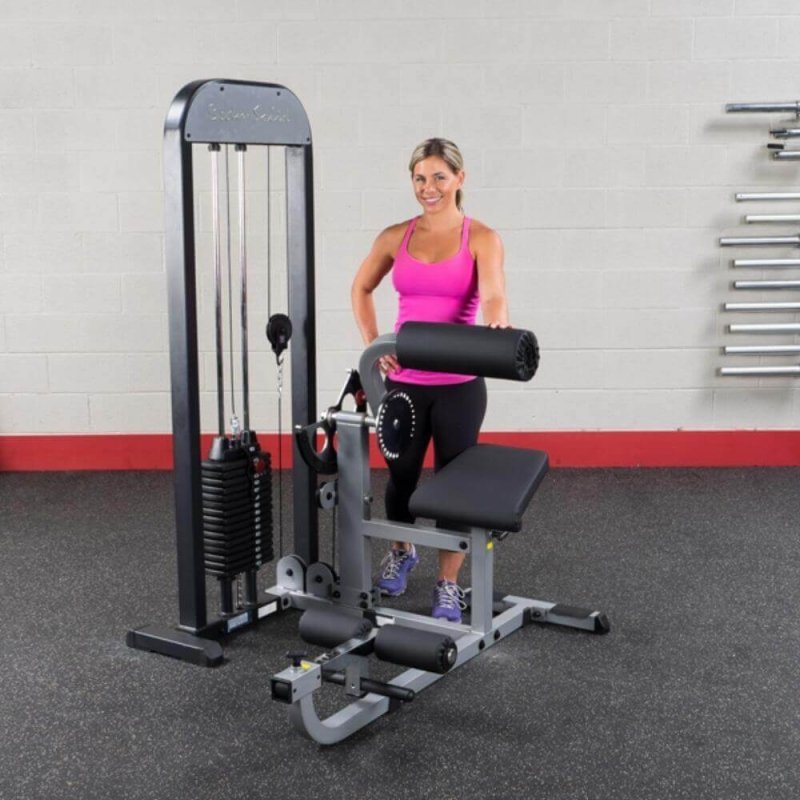 Body-Solid Pro Select Ab And Back Machine GCAB-STK - Woman standing behind the product