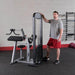 Body-Solid Pro Select Biceps And Triceps Machine GCBT-STK - Man standing beside the product