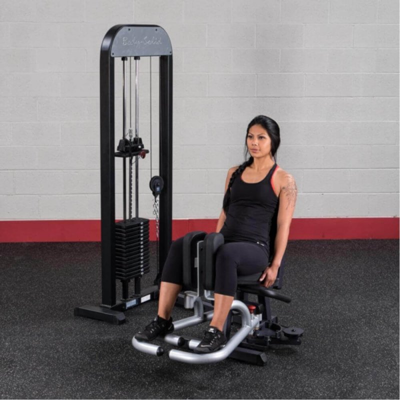 Body-Solid Pro-Select Inner/Outer Thigh Machine GIOT-STK - Woman on outer thigh abduction exercise