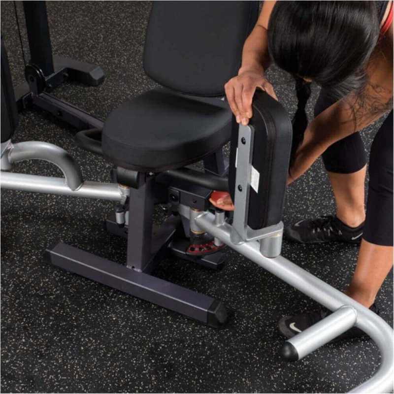 Body-Solid Pro-Select Inner/Outer Thigh Machine GIOT-STK - woman assembling the cushioned thigh support