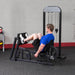 Body-Solid Pro-Select Leg And Calf Press Machine GLP-STK - Man legs curl up for leg press workout