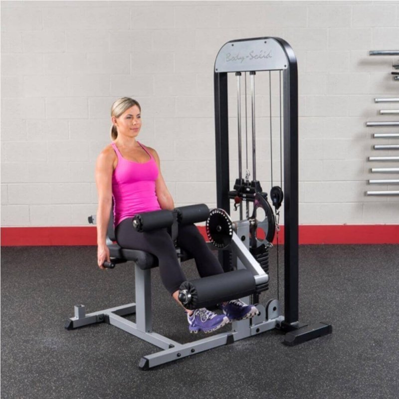 Body-Solid Pro Select Leg Extension Leg Curl Station GCEC-STK - Woman sitting on the product