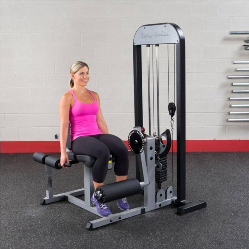 Body-Solid Pro Select Leg Extension Leg Curl Station GCEC-STK - Woman sitting down