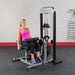 Body-Solid Pro Select Leg Extension Leg Curl Station GCEC-STK - Woman resting