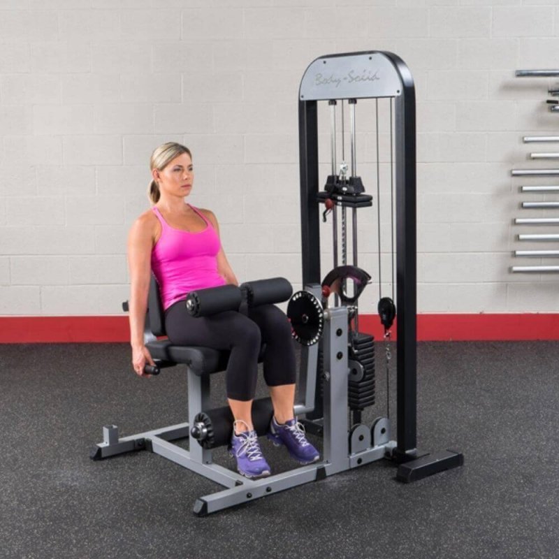 Body-Solid Pro Select Leg Extension Leg Curl Station GCEC-STK - Woman resting