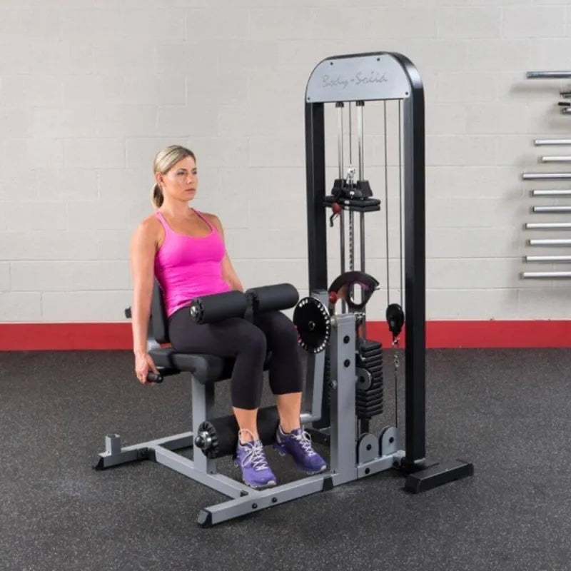 Body-Solid Pro Select Leg Extension Leg Curl Station GCEC-STK - Woman resting