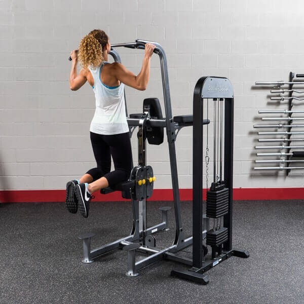 Body-Solid Pro Select Weight Assisted Chin-Dip Machine FCD-STK - woman chin up position workout