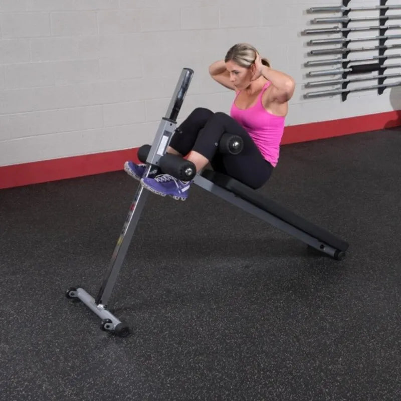 Body-Solid Pro-Style Ab Board GAB60 - Woman on curl position 