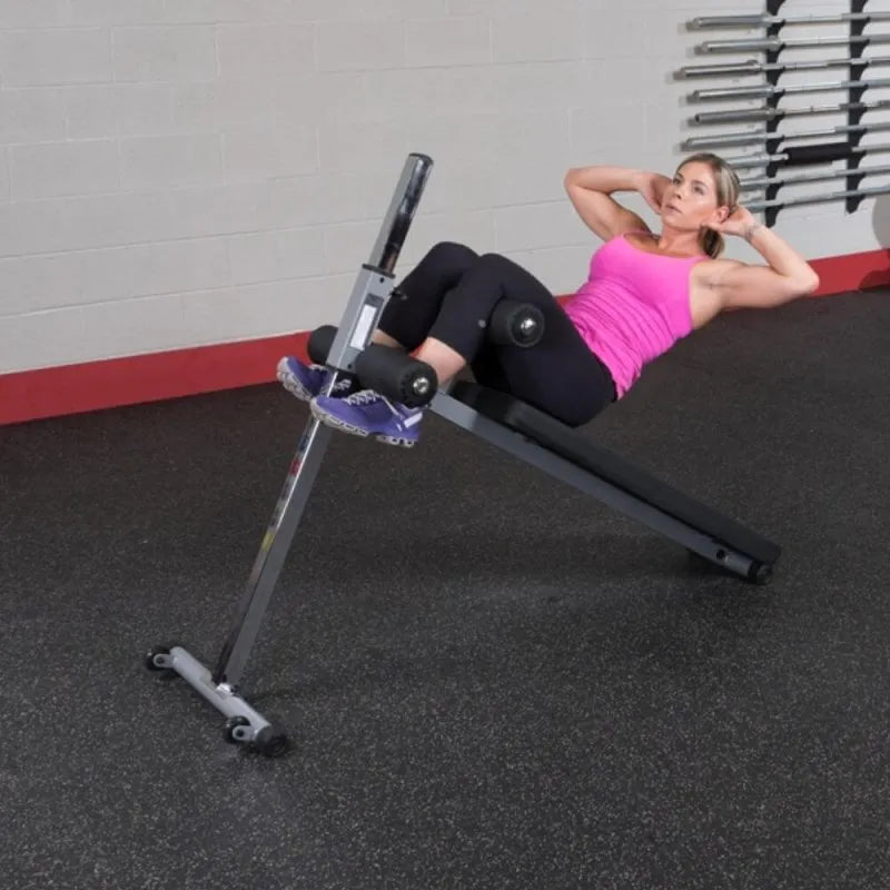 Body-Solid Pro-Style Ab Board GAB60 - Woman showing workout training on bench
