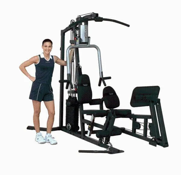Body-Solid Selectorized Single Stack Home Gym G3S - Woman standing next go G3S