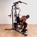 Body-Solid Selectorized Single Stack Home Gym G3S -  a person working out on a machine
