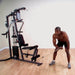 Body-Solid Selectorized Single Stack Home Gym G3S -  Man working out with gym equipment.