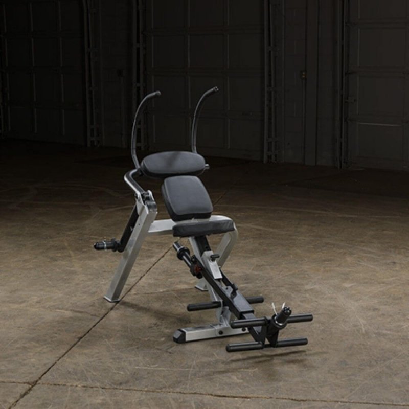 Body-Solid Semi-Recumbent Ab Bench GAB300 - Set up in a room with gray metal walls